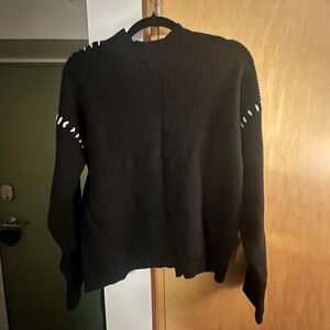 Black Sweater with White Accents